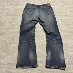 Levi's y2k 2000s dark wash denim low rise relaxed flared bootcut grunge jeans